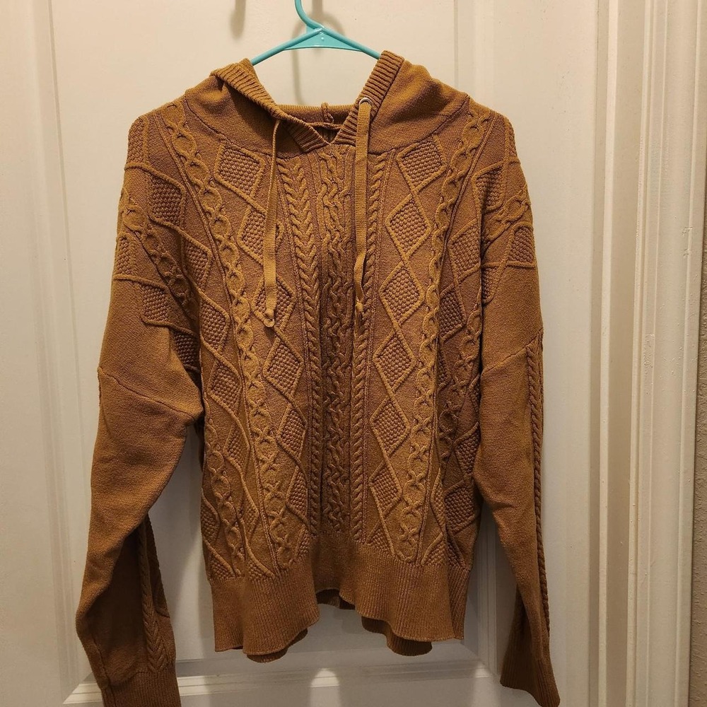 Brown cable knit hoodie with diamond and braided patterns